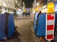 The barriers are seen as closed at the Bochum Christmas market in Bochum, Germany, on December 3, 2024, as several large anti-terror vehicle...