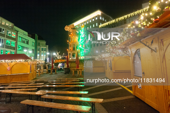 A general view shows the closed Bochum Christmas market in Bochum, Germany, on December 3, 2024, as several large anti-terror vehicle barrie...