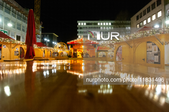 A general view shows the closed Bochum Christmas market in Bochum, Germany, on December 3, 2024, as several large anti-terror vehicle barrie...