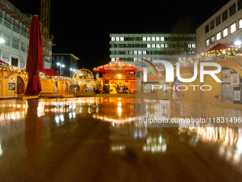 A general view shows the closed Bochum Christmas market in Bochum, Germany, on December 3, 2024, as several large anti-terror vehicle barrie...