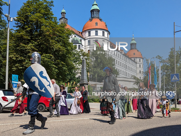 In Neuburg an der Donau, Germany, on July 9, 2023, the city hosts a grand historical parade as part of its annual castle festival. Around 2,...