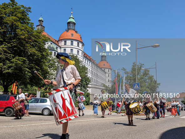 In Neuburg an der Donau, Germany, on July 9, 2023, the city hosts a grand historical parade as part of its annual castle festival. Around 2,...