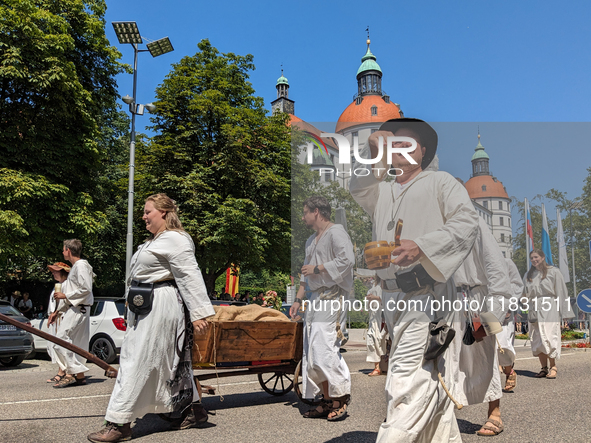 In Neuburg an der Donau, Germany, on July 9, 2023, the city hosts a grand historical parade as part of its annual castle festival. Around 2,...