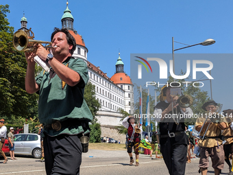 In Neuburg an der Donau, Germany, on July 9, 2023, the city hosts a grand historical parade as part of its annual castle festival. Around 2,...