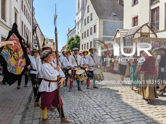 In Neuburg an der Donau, Germany, on July 9, 2023, the city hosts a grand historical parade as part of its annual castle festival. Around 2,...