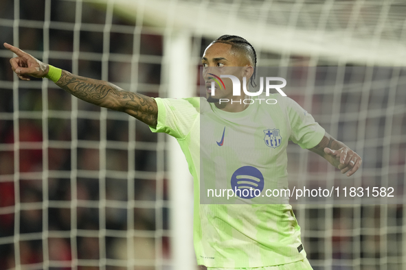 Raphinha right winger of Barcelona and Brazil celebrates after scoring his sides second goal during the La Liga match between RCD Mallorca a...