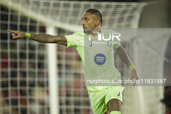 Raphinha right winger of Barcelona and Brazil celebrates after scoring his sides second goal during the La Liga match between RCD Mallorca a...