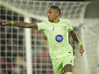 Raphinha right winger of Barcelona and Brazil celebrates after scoring his sides second goal during the La Liga match between RCD Mallorca a...