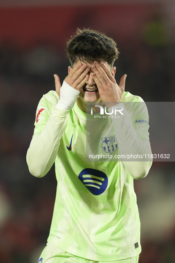 Pau Victor centre-forward of Barcelona and Spain celebrates after scoring his sides first goal during the La Liga match between RCD Mallorca...