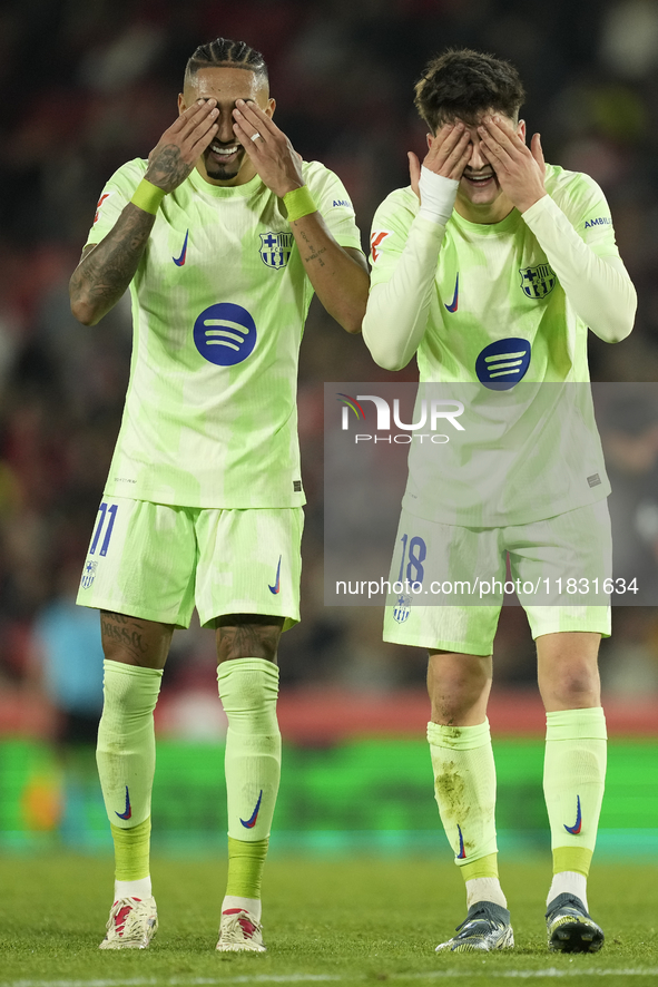 Pau Victor centre-forward of Barcelona and Spain celebrates with Raphinha right winger of Barcelona and Brazil after scoring his sides first...