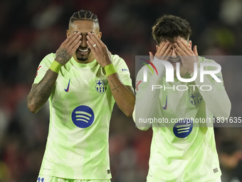 Pau Victor centre-forward of Barcelona and Spain celebrates with Raphinha right winger of Barcelona and Brazil after scoring his sides first...