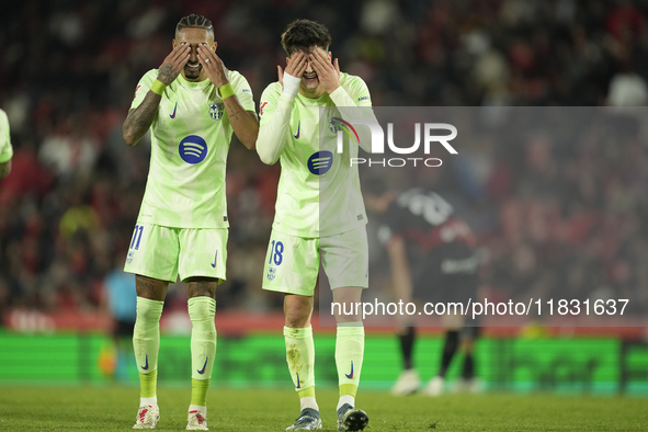 Pau Victor centre-forward of Barcelona and Spain celebrates with Raphinha right winger of Barcelona and Brazil after scoring his sides first...