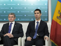 President of the Parliament of Moldova, Igor Grosu, and Foreign Minister of Moldova, Mihai Popsoi, participate in a discussion titled ''Mold...