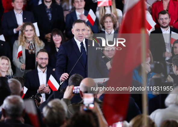 Karol Nawrocki, a Polish historian and president of the Institute of National Remembrance, is presented as the presidential candidate during...