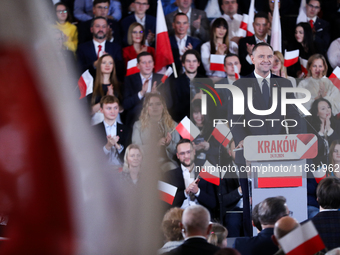 Karol Nawrocki, a Polish historian and president of the Institute of National Remembrance, is presented as the presidential candidate during...