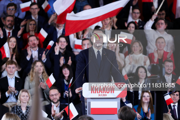 Karol Nawrocki, a Polish historian and president of the Institute of National Remembrance, is presented as the presidential candidate during...