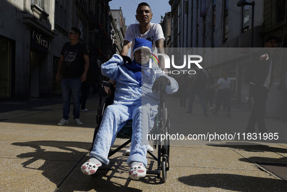 On December 3, 2024, in Mexico City, Mexico, people with disabilities demonstrate on the International Day of Persons with Disabilities. The...