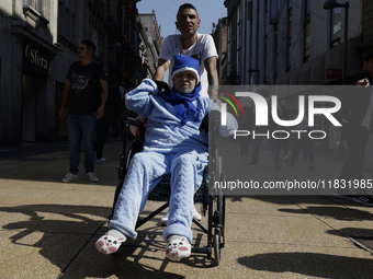 On December 3, 2024, in Mexico City, Mexico, people with disabilities demonstrate on the International Day of Persons with Disabilities. The...