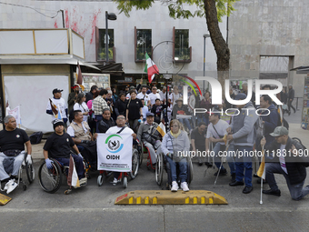 On December 3, 2024, in Mexico City, Mexico, people with disabilities demonstrate on the International Day of Persons with Disabilities. The...