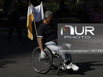 On December 3, 2024, in Mexico City, Mexico, people with disabilities demonstrate on the International Day of Persons with Disabilities. The...