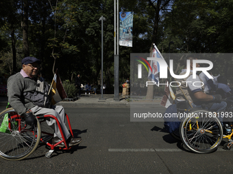 On December 3, 2024, in Mexico City, Mexico, people with disabilities demonstrate on the International Day of Persons with Disabilities. The...