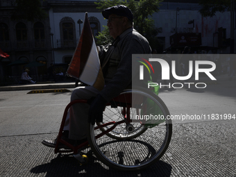 On December 3, 2024, in Mexico City, Mexico, people with disabilities demonstrate on the International Day of Persons with Disabilities. The...