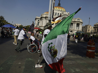 People with disabilities demonstrate on the occasion of the International Day of Persons with Disabilities, marching on Avenida Juarez to th...