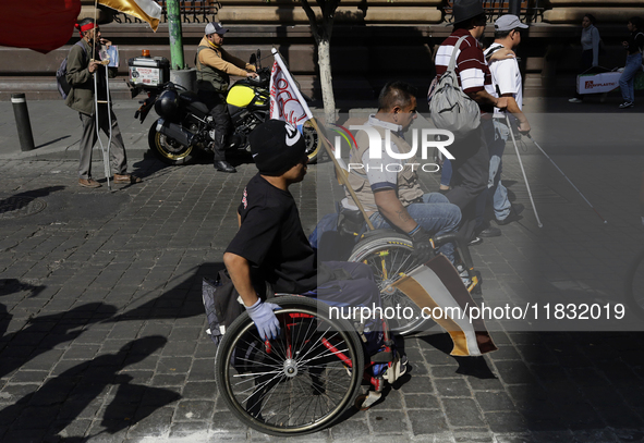 On December 3, 2024, in Mexico City, Mexico, people with disabilities demonstrate on the International Day of Persons with Disabilities. The...