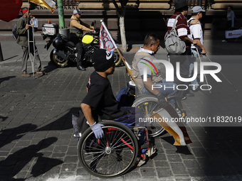 On December 3, 2024, in Mexico City, Mexico, people with disabilities demonstrate on the International Day of Persons with Disabilities. The...