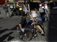 On December 3, 2024, in Mexico City, Mexico, people with disabilities demonstrate on the International Day of Persons with Disabilities. The...