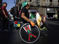 On December 3, 2024, in Mexico City, Mexico, dozens of people with disabilities and wheelchair users demonstrate on the occasion of the Inte...