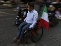 On December 3, 2024, in Mexico City, Mexico, dozens of people with disabilities and wheelchair users demonstrate on the occasion of the Inte...