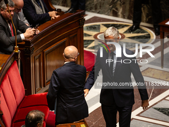 Eric Ciotti, President of the UDR group, and Laurent Wauquiez, President of the Droite Republicaine group, are seen during the questions to...