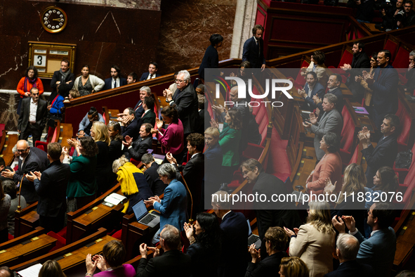 MP deputies of the left-wing parliamentary groups are seen during the session of questions to the government at the National Assembly in Par...