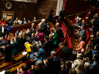 MP deputies of the left-wing parliamentary groups are seen during the session of questions to the government at the National Assembly in Par...