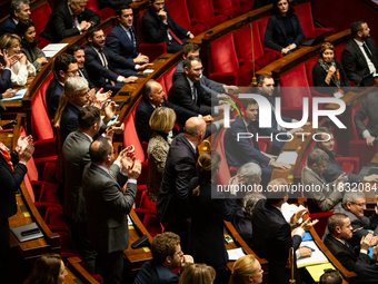 Deputies of Droite Republicaine argue with deputies of Rassemblement National during the questions to the government session at the National...