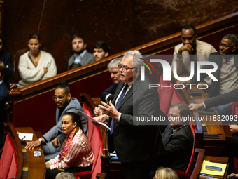 Andre Chassaigne, President of the Gauche Democrate et Republicaine group, speaks during the questions to the government session at the Nati...