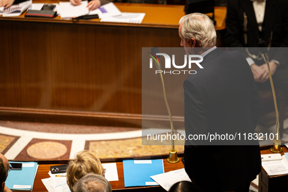 French Prime Minister Michel Barnier rises to speak at the questions to the government session at the National Assembly in Paris, France, on...