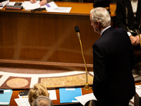 French Prime Minister Michel Barnier rises to speak at the questions to the government session at the National Assembly in Paris, France, on...