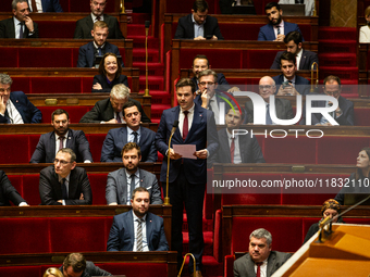 Alexandre Sabatou, deputy of the Rassemblement National group, speaks during the session of questions to the government at the National Asse...