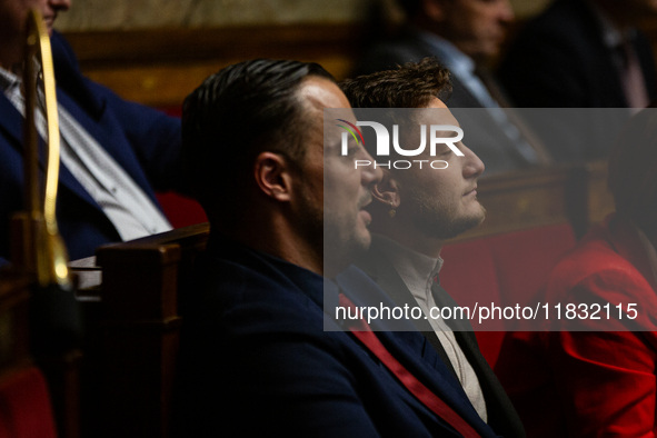 Sebastien Delogu (left) and Raphael Arnault (right), MP deputies of the La France Insoumise group, are seen during the questions to the gove...