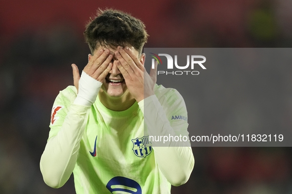 Pau Victor centre-forward of Barcelona and Spain celebrates after scoring his sides first goal during the La Liga match between RCD Mallorca...