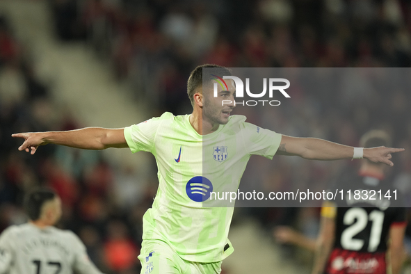 Ferran Torres left winger of Barcelona and Spain celebrates after scoring his sides first goal during the La Liga match between RCD Mallorca...