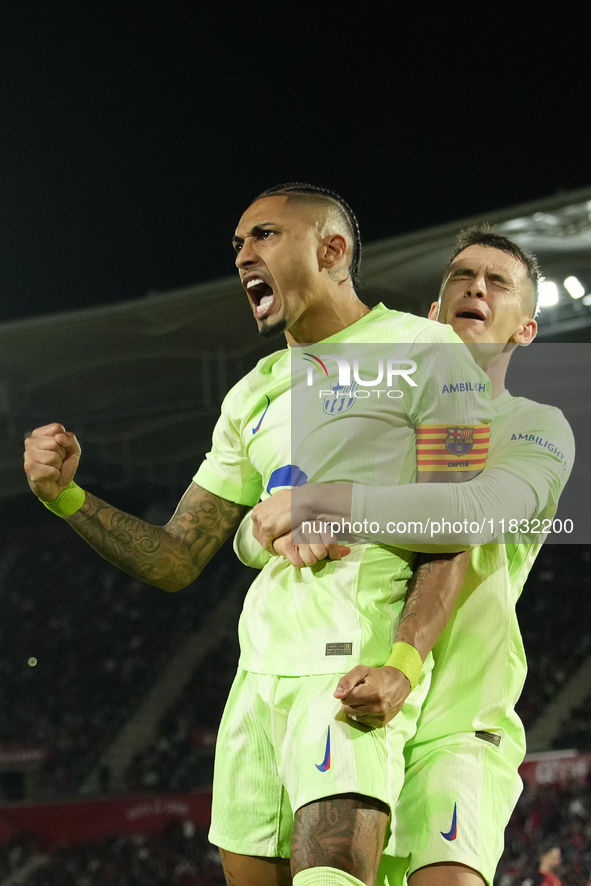 Raphinha right winger of Barcelona and Brazil celebrates after scoring his sides first goal during the La Liga match between RCD Mallorca an...