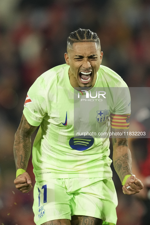 Raphinha right winger of Barcelona and Brazil celebrates after scoring his sides first goal during the La Liga match between RCD Mallorca an...