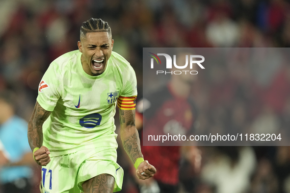 Raphinha right winger of Barcelona and Brazil celebrates after scoring his sides first goal during the La Liga match between RCD Mallorca an...