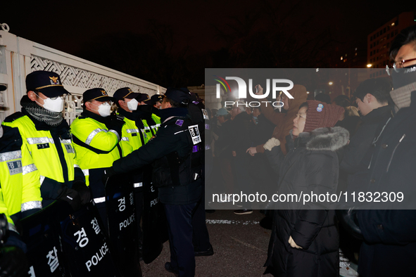 Hundreds of citizens gather in front of the National Assembly in Seoul, South Korea, on December 4, 2024, demanding the repeal of the martia...