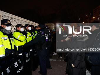 Hundreds of citizens gather in front of the National Assembly in Seoul, South Korea, on December 4, 2024, demanding the repeal of the martia...