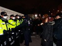 Hundreds of citizens gather in front of the National Assembly in Seoul, South Korea, on December 4, 2024, demanding the repeal of the martia...