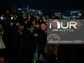 Hundreds of citizens gather in front of the National Assembly in Seoul, South Korea, on December 4, 2024, demanding the repeal of the martia...